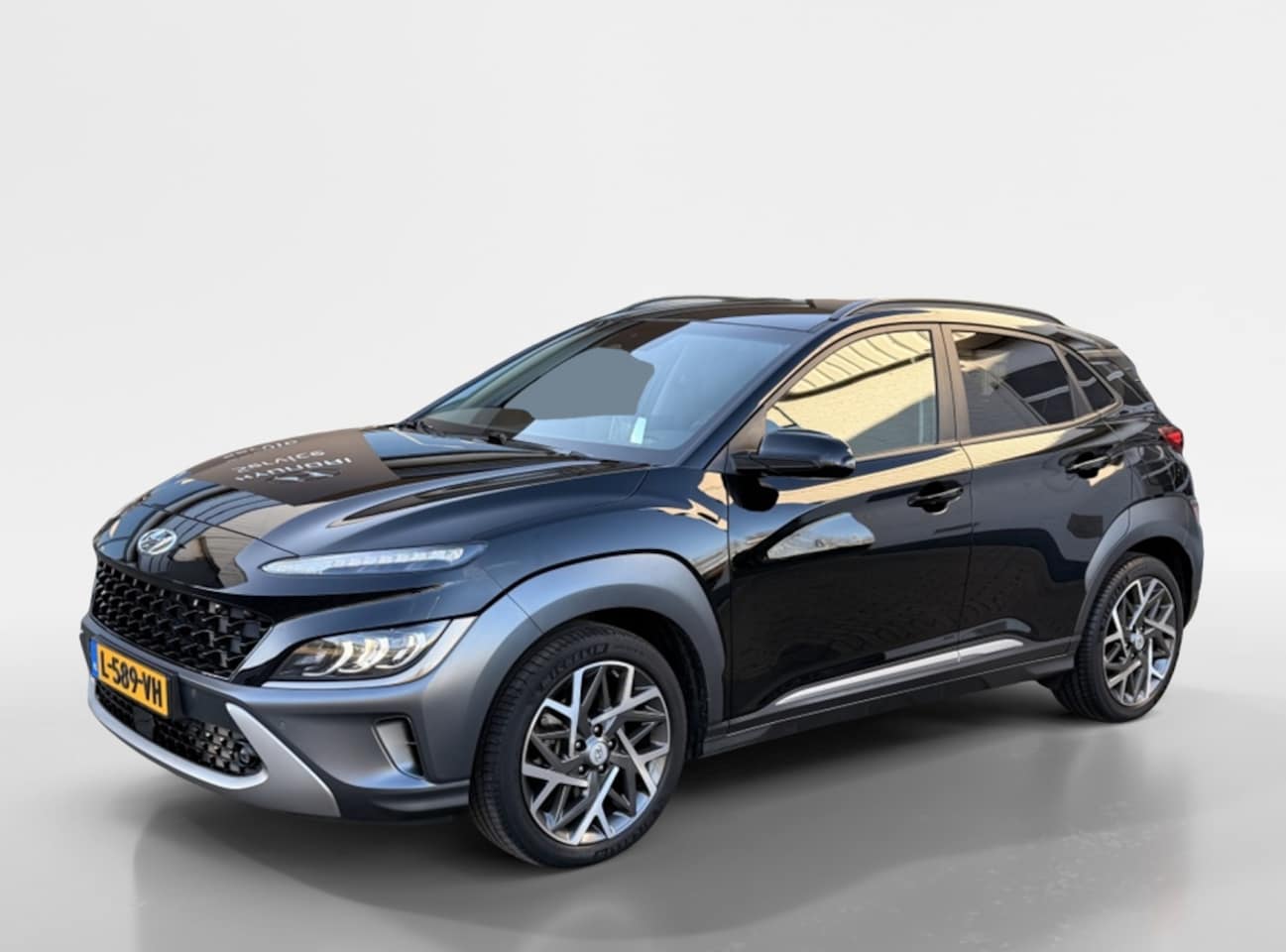 Hyundai Kona - 1.6 GDI HEV Premium | Leder | Navigatie | Stoel verwarming | Com - AutoWereld.nl