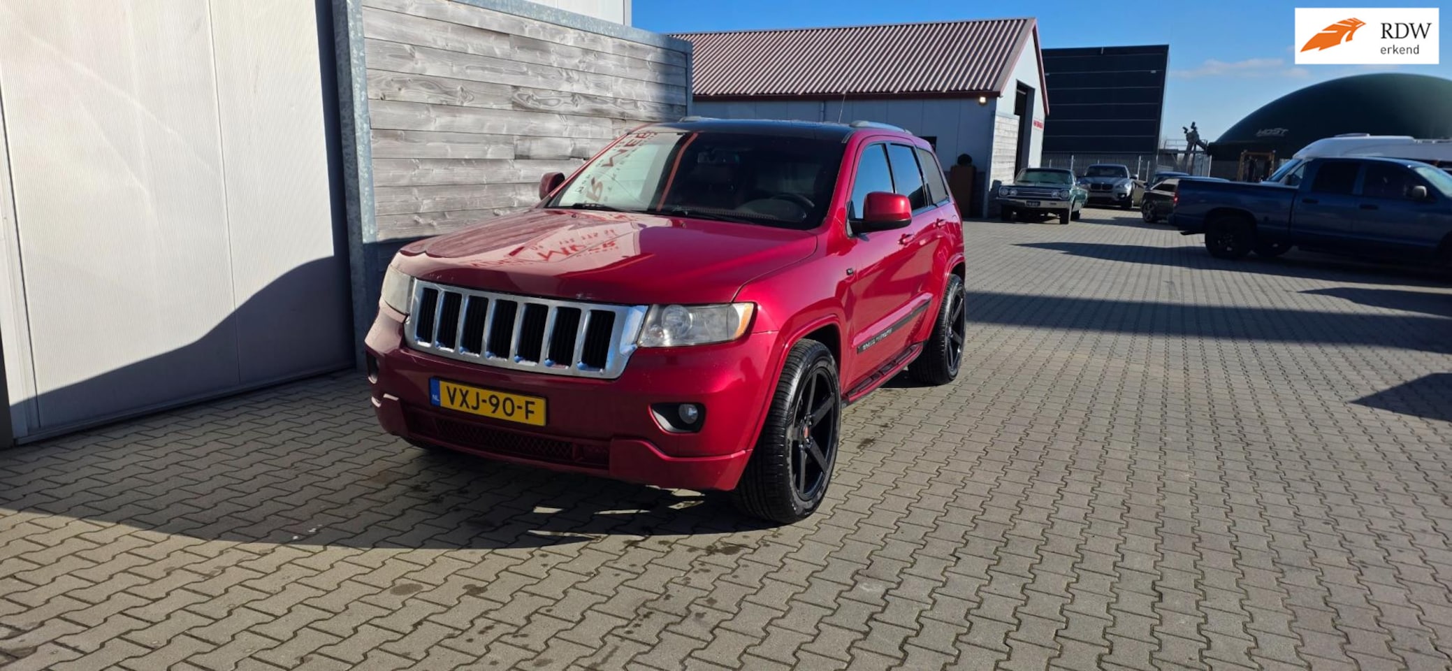 Jeep Grand Cherokee - 5.7 V8 Overland Summit 5.7 V8 Overland Summit - AutoWereld.nl