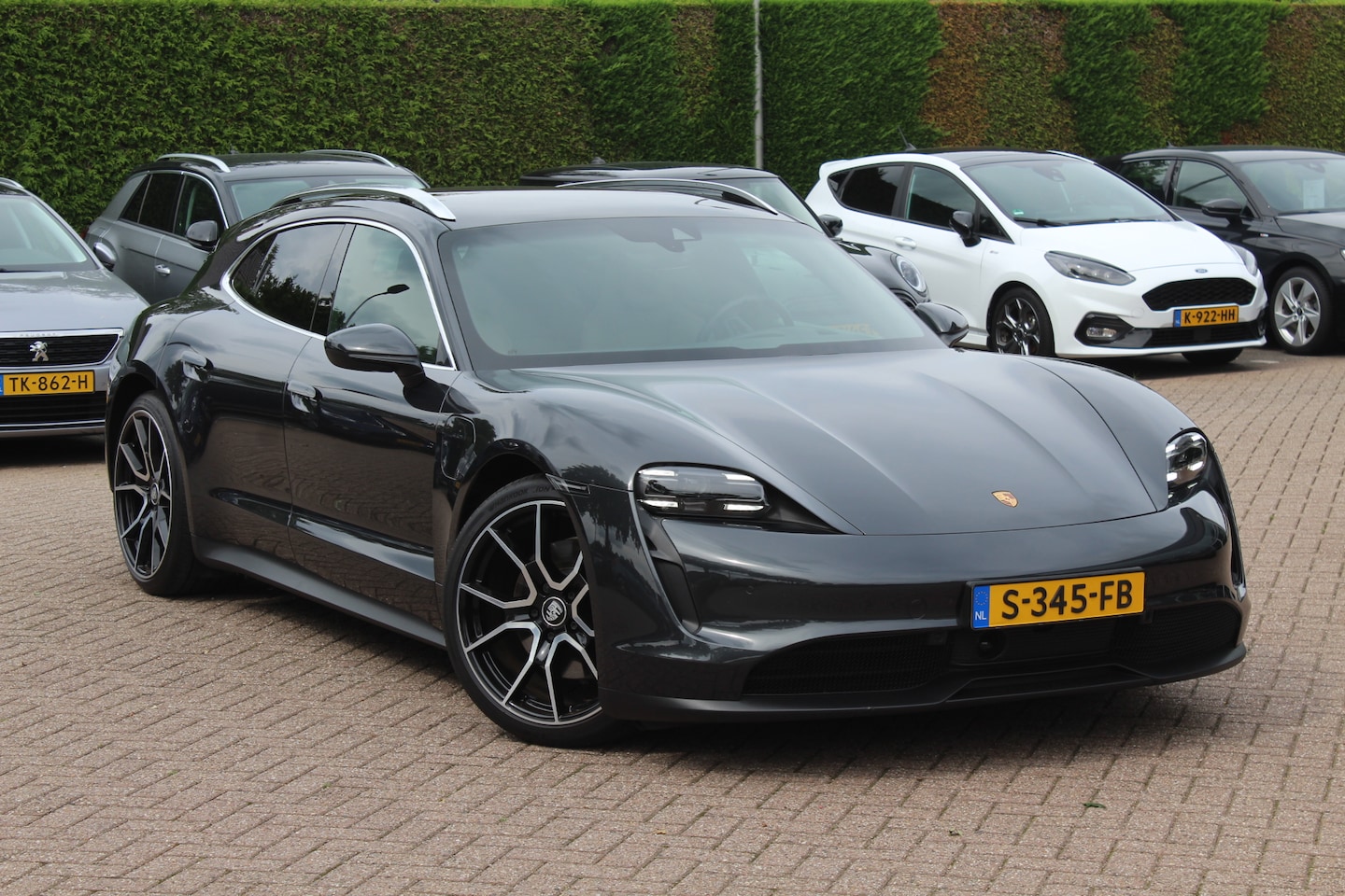 Porsche Taycan Sport Turismo - 93 kWh / SoH 90.8% / Panoramadak / Camera / Adaptieve stoelen / Luchtvering / 21'' / Bose - AutoWereld.nl