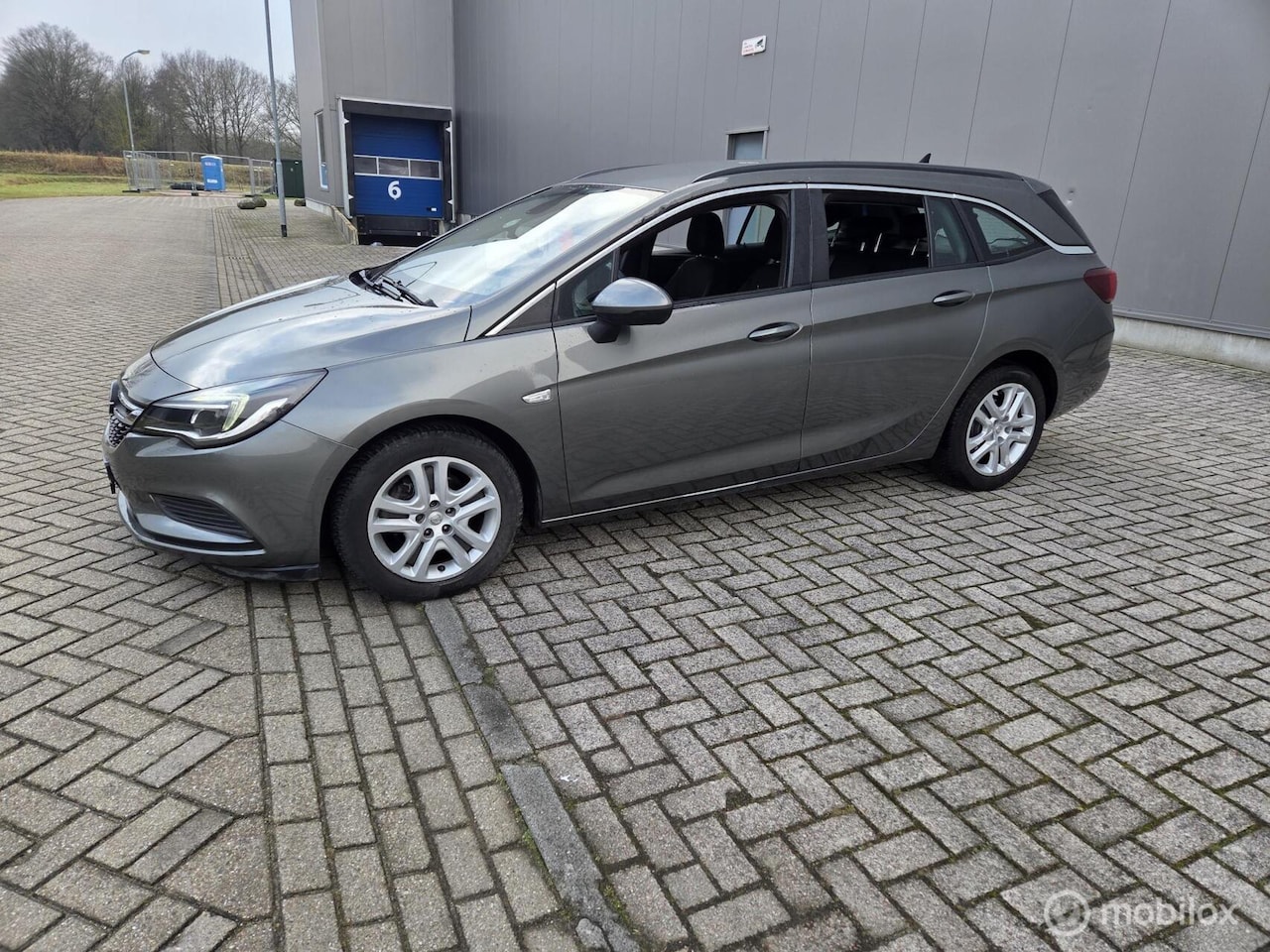 Opel Astra Sports Tourer - 1.6 CDTI Business 1.6 CDTI Business - AutoWereld.nl