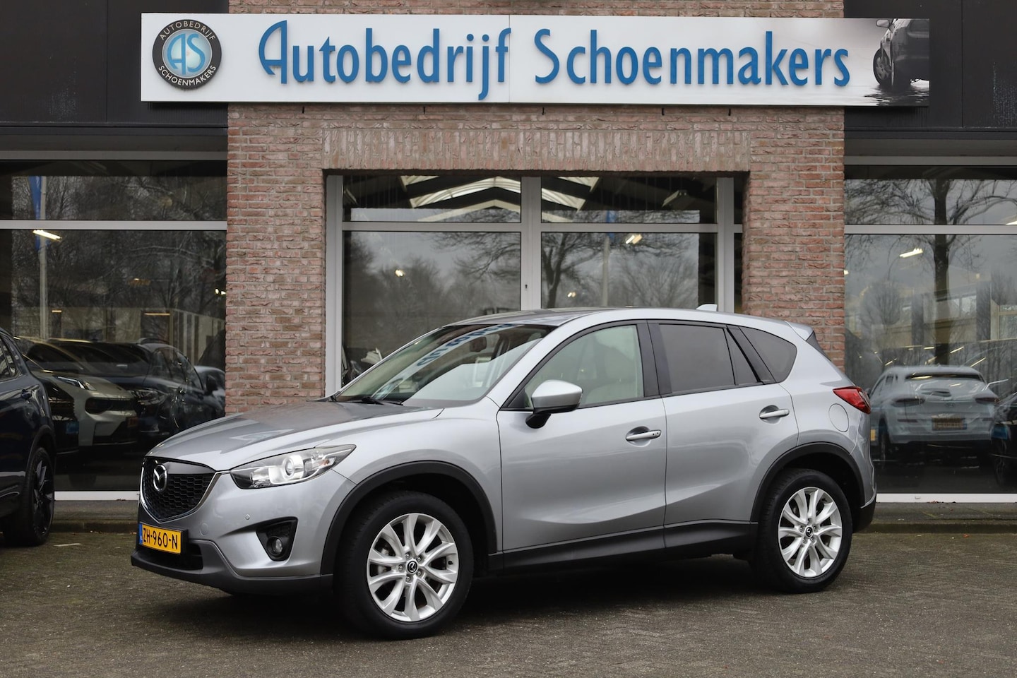 Mazda CX-5 - 2.0 TS+ 4WD LEER CAMERA TREKHAAK STOELVERWARMING BOSE NAVI CRUISE 2xPDC CLIMA 19"LMV - AutoWereld.nl
