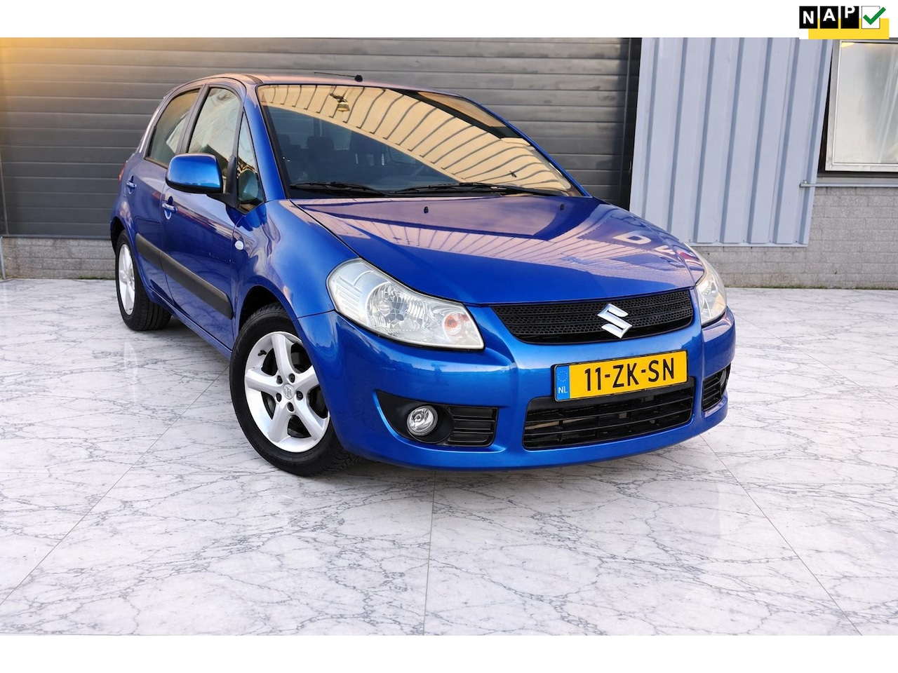 Suzuki SX4 - 1.6 Exclusive PDC/Carplay/Navi /Keylees - AutoWereld.nl