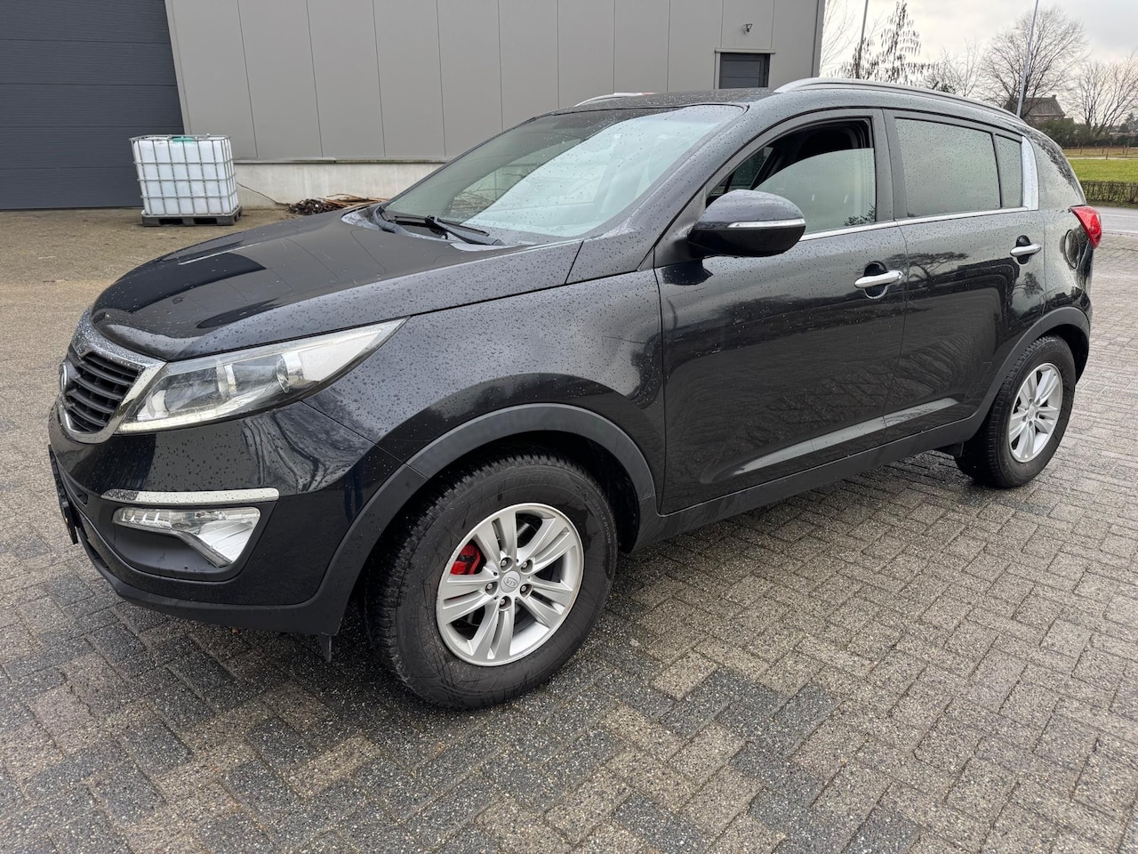Kia Sportage - 2.0 Plus Pack Navi Camera Pano cruiseC - AutoWereld.nl