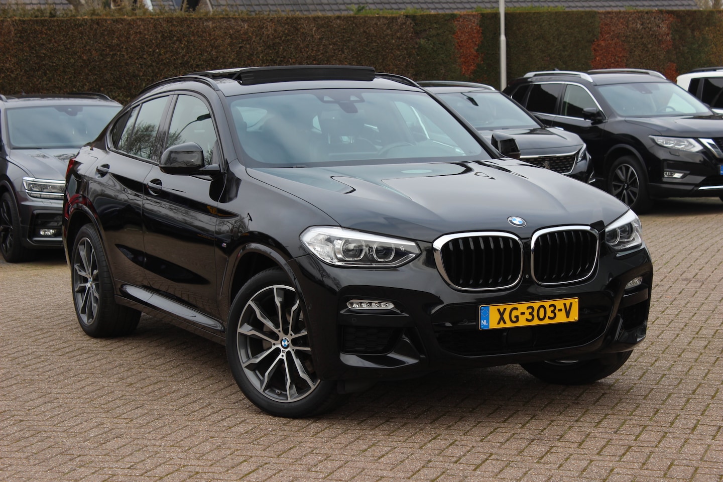 BMW X4 - xDrive20i High Exe. M Sport / Panoramadak / 360Camera / Leder / 20'' / Harman Kardon / Nav - AutoWereld.nl
