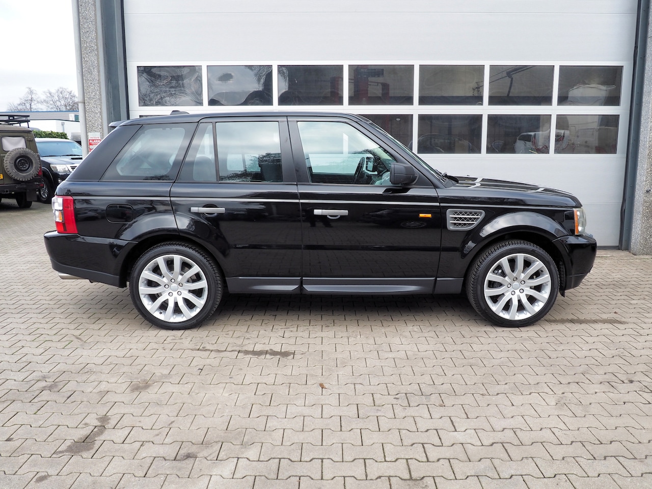 Land Rover Range Rover Sport - 4.2 V8 Supercharged LUXE SCHUIFDAK LEDER TREKH