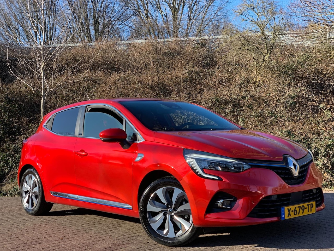 Renault Clio - 1.6 E-Tech Hybrid 140 Business Zen NIEUWSTAAT LUXE ! - AutoWereld.nl
