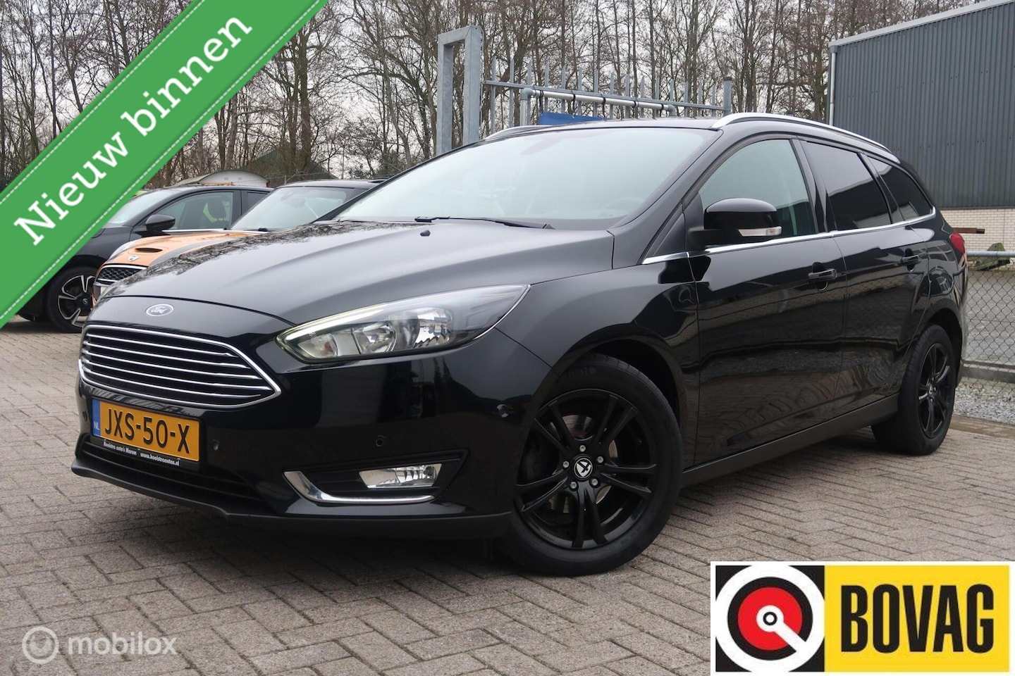 Ford Focus Wagon - 1.0 Titanium NAVI,CRUISECONTROL,STOELVERWARM - AutoWereld.nl