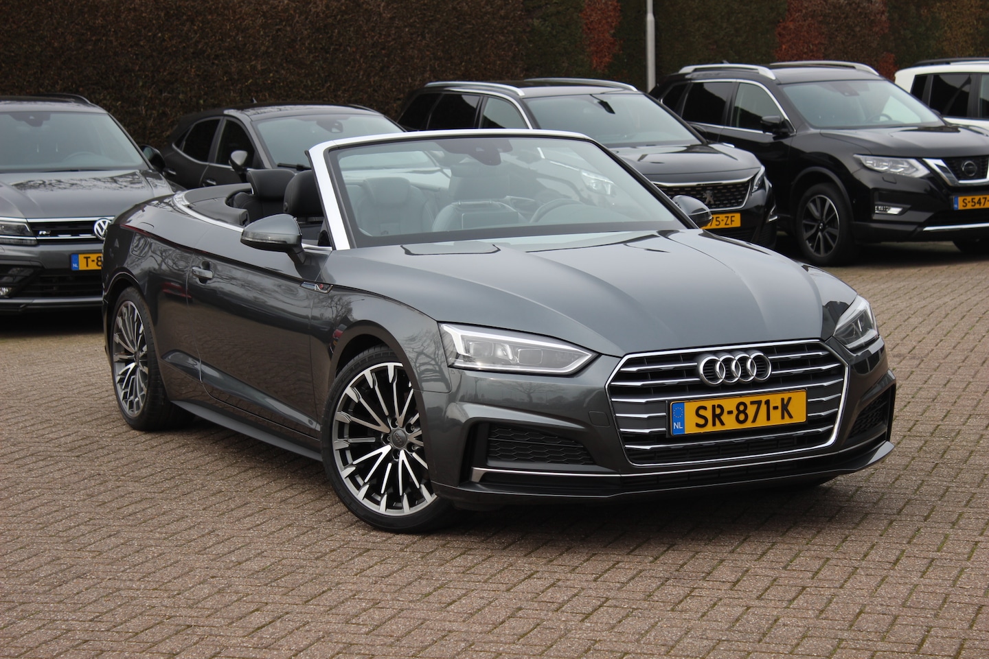 Audi A5 Cabriolet - 2.0 TFSI Launch Edition / Leder / Nekverwarming / Navigatie / Parkeerhulp V+A / 19'' / Win - AutoWereld.nl