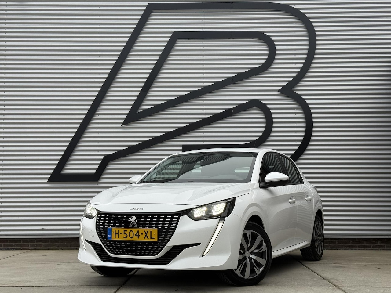 Peugeot 208 - 1.2 PureTech Active 2e Eigenaar|Navi|Carplay|Cruise|D-riem v.v. in 2023|N.A.P|APK tot 06-2 - AutoWereld.nl