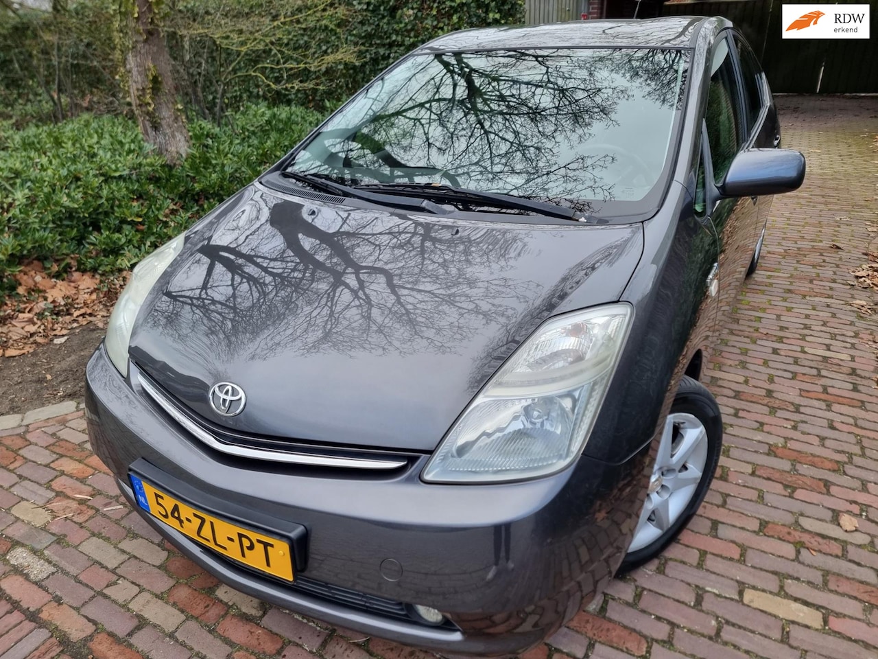 Toyota Prius - HYBRID 1.5 VVT-i Tech Camera/Leer/Navi - AutoWereld.nl