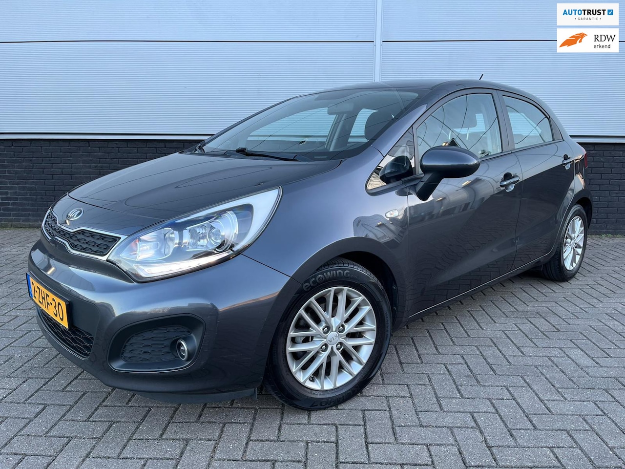 Kia Rio - 1.2 CVVT BusinessLine 5drs Airco - cruise control - usb & aux - bluetooth - lm velgen - NA - AutoWereld.nl
