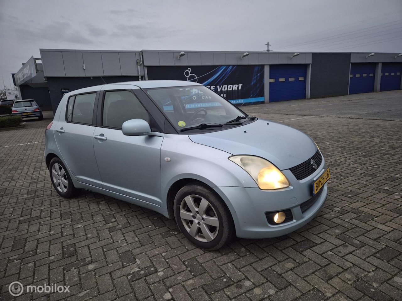 Suzuki Swift - 1.3 Comfort airco 5 deurs - AutoWereld.nl