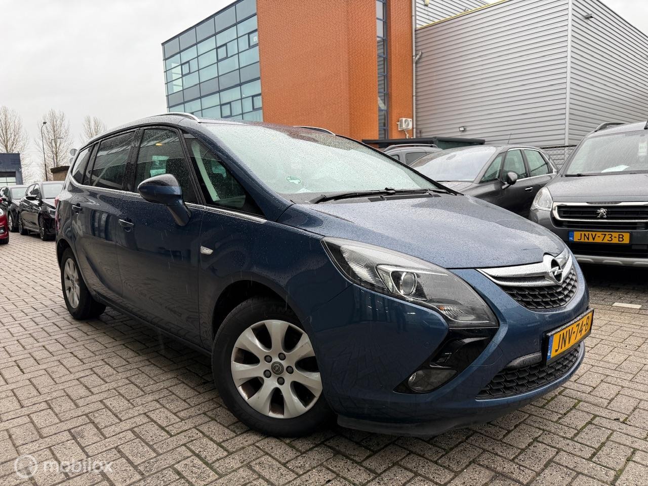 Opel Zafira - 1.4 Benzine | Trekhaak | 7 zitplaatsen | Hoge instap - AutoWereld.nl