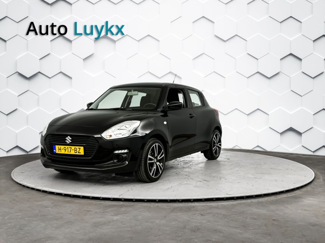 Suzuki Swift - 1.2 Comfort Smart Hybrid | Airco | Bluetooth | L.M. Velgen - AutoWereld.nl