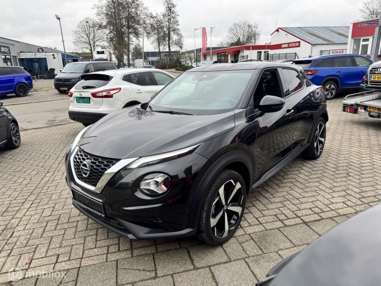 Nissan Juke - 1.0 DIG-T Tekna BOSE UITVOERING FULL OPTIONS - AutoWereld.nl