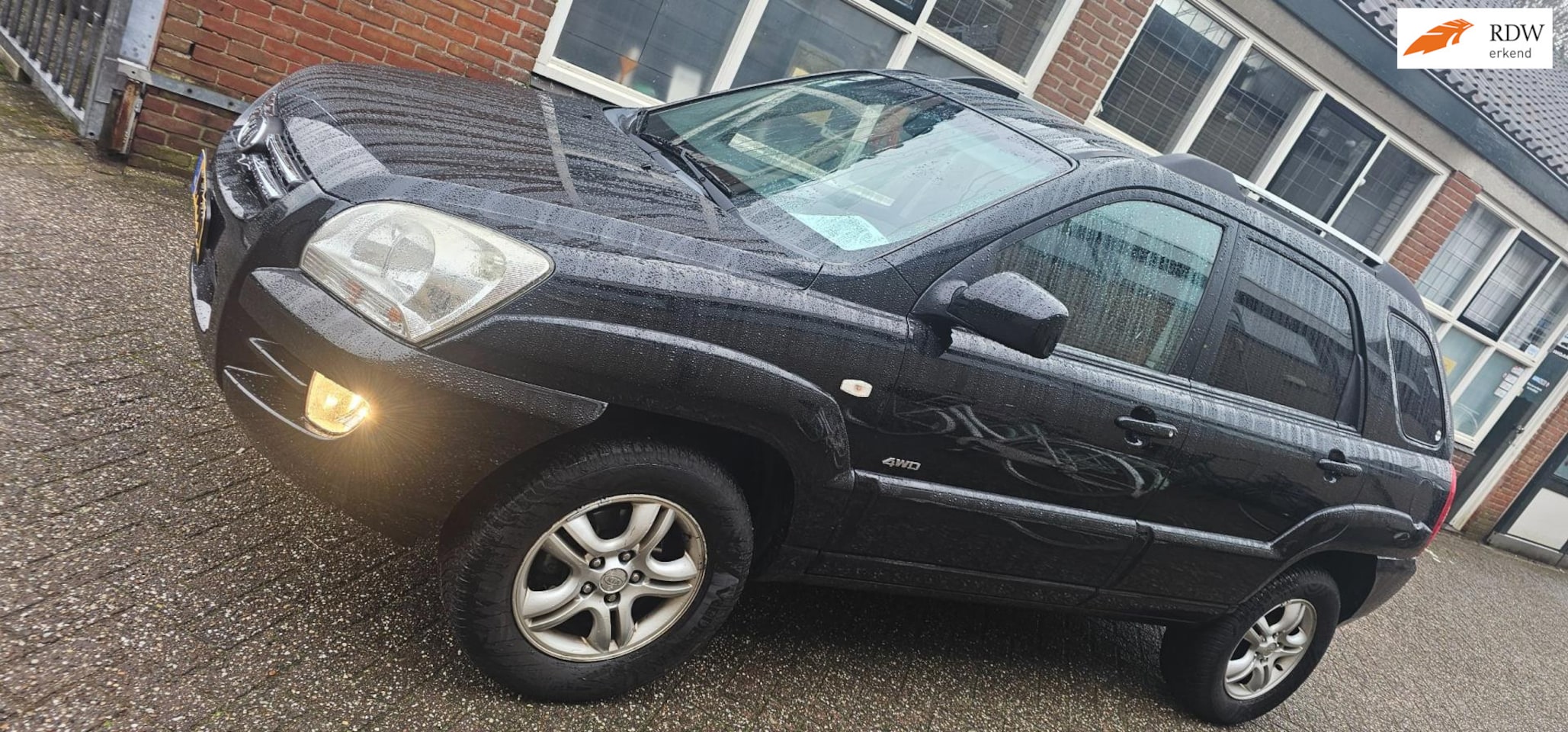 Kia Sportage - 2.7 V6 M-bition 4WD aut - AutoWereld.nl