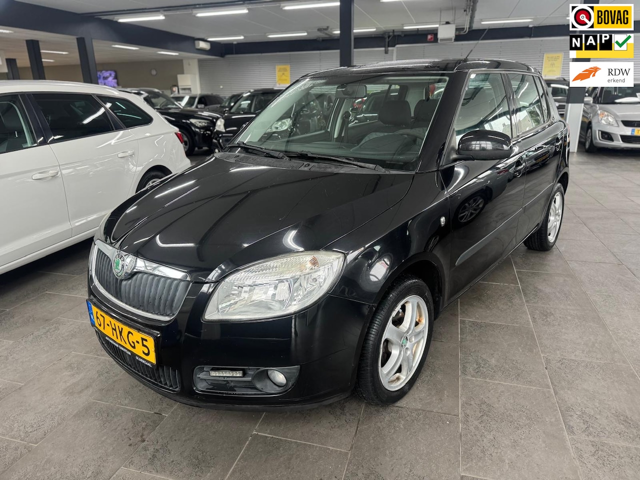 Skoda Fabia - 1.4-16V Ambiente 5-deurs navigatie airco elektrische pakket cruise controle lm-velgen - AutoWereld.nl