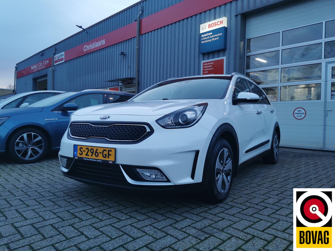 Kia Niro - 1.6 GDi Hybrid First Edition Parelmoer wit - AutoWereld.nl