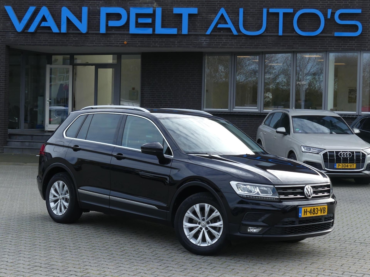Volkswagen Tiguan - 1.5 TSI Comfortline Business / Carplay / Trekhaak / Leer - AutoWereld.nl