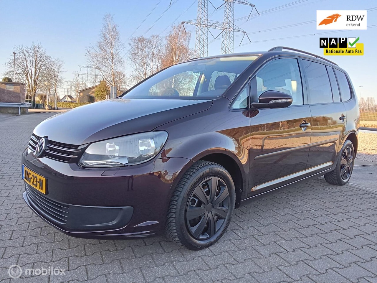 Volkswagen Touran - 1.2 TSI Comfortline BlueMotion 7p. 1.2 TSI Comfortline BlueMotion 7p./clima/navi - AutoWereld.nl