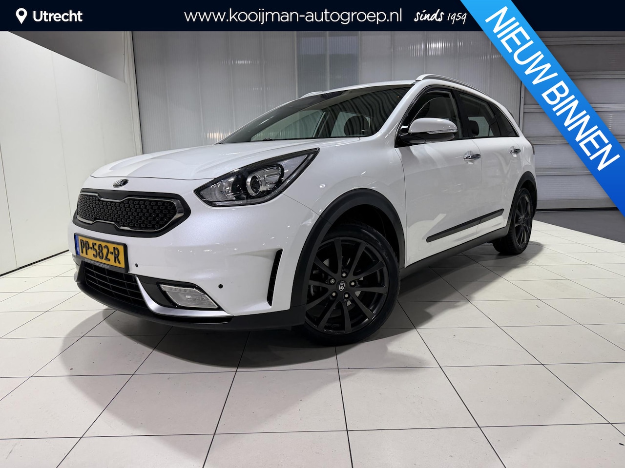 Kia Niro - 1.6 GDi Hybrid First Edition Trekhaak, Leer, Navigatie, Camera. - AutoWereld.nl