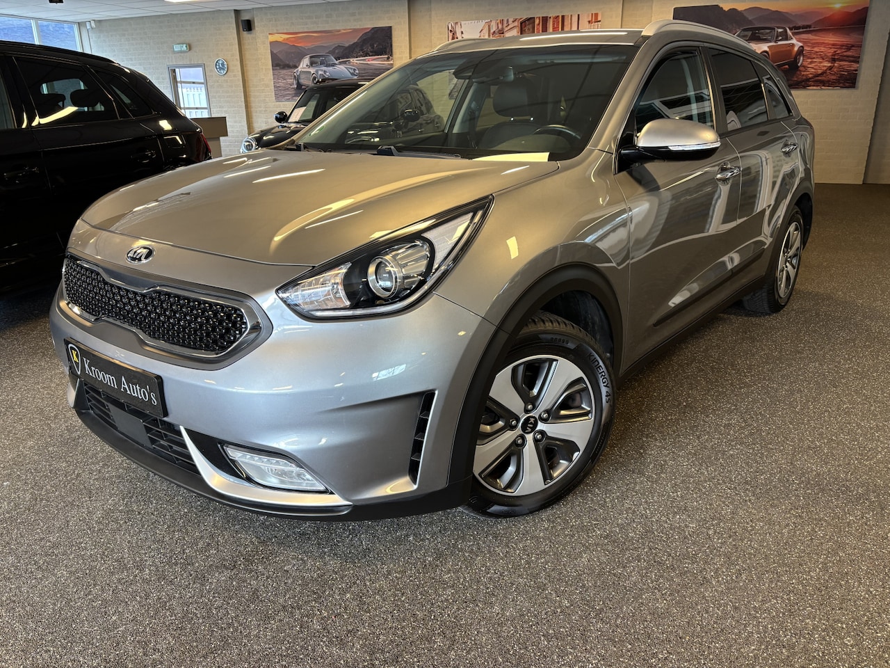 Kia Niro - 1.6 GDi Hybrid DynamicPlusLine trekhaak, stuur en stoel verwarming, leder, navigatie - AutoWereld.nl