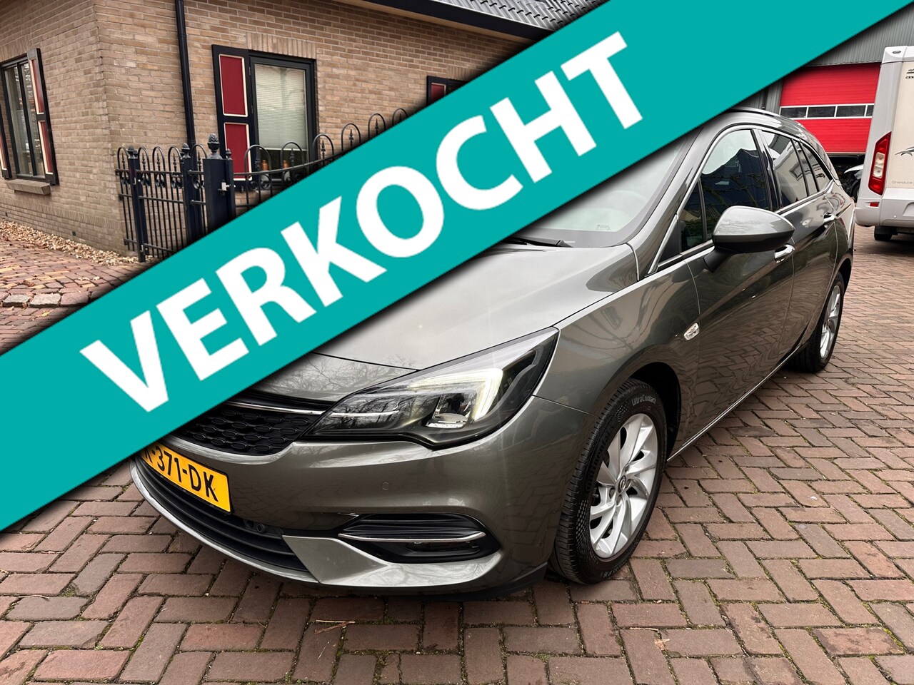 Opel Astra Sports Tourer - 1.2 Business Elegance 1.2 Business Elegance - AutoWereld.nl