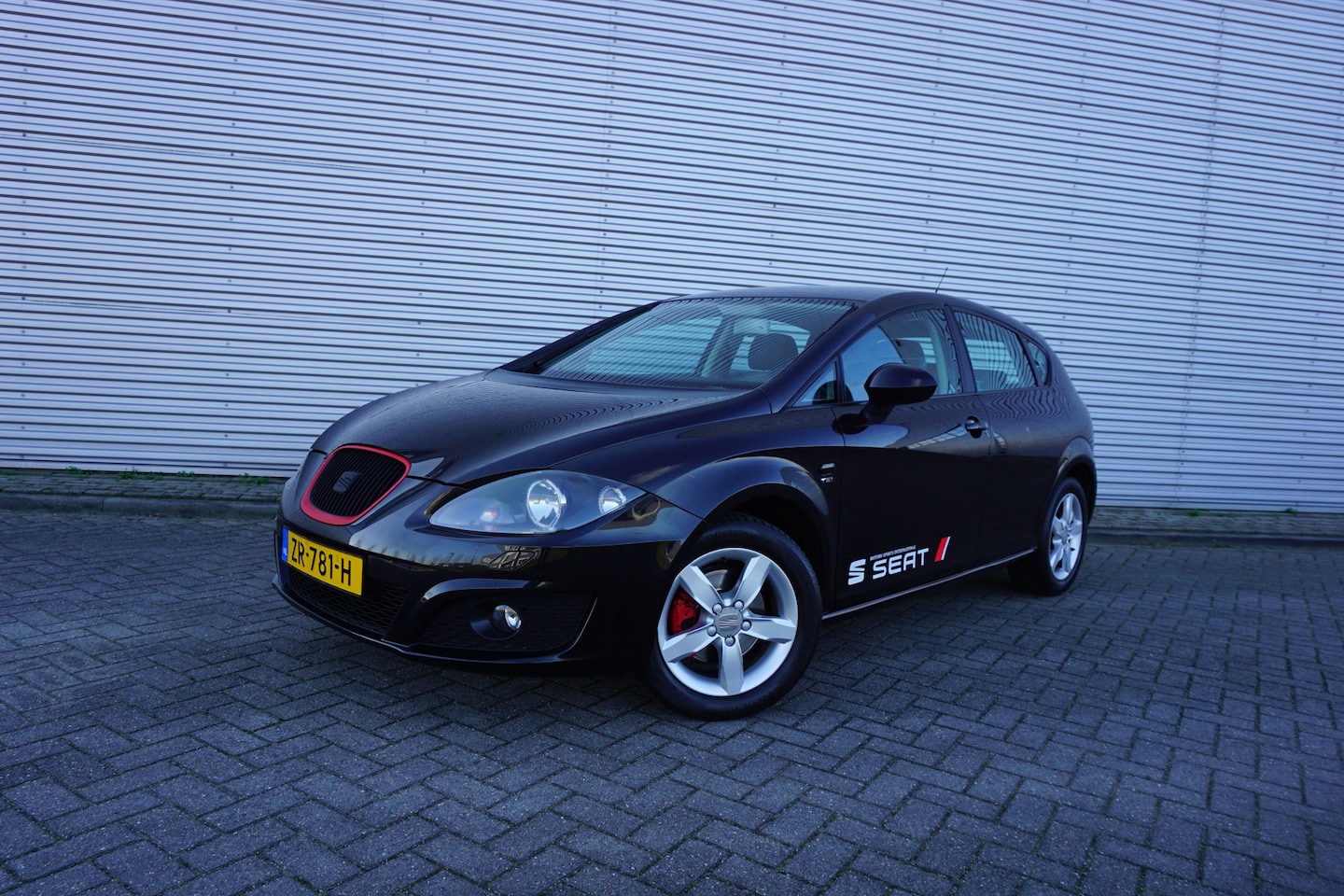SEAT Leon - 1.8 TFSI Style Airco / Navi / Cruise / Stoelverw. / Parkeersens. / Elektr. ramen / Lm velg - AutoWereld.nl