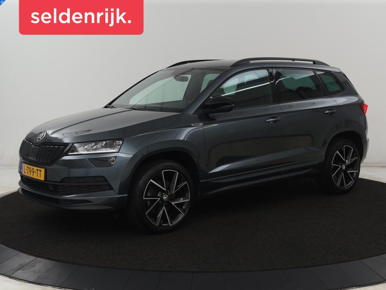 Skoda Karoq - 1.5 TSI Sportline | Trekhaak | Stoelverwarming | Virtual Cockpit | Stuurverwarming | Carpl - AutoWereld.nl