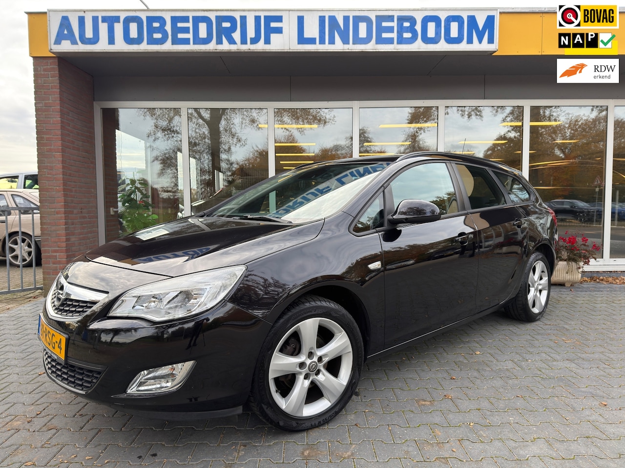Opel Astra Sports Tourer - 1.4 Edition Trekhaak,Airco,Cruise control - AutoWereld.nl
