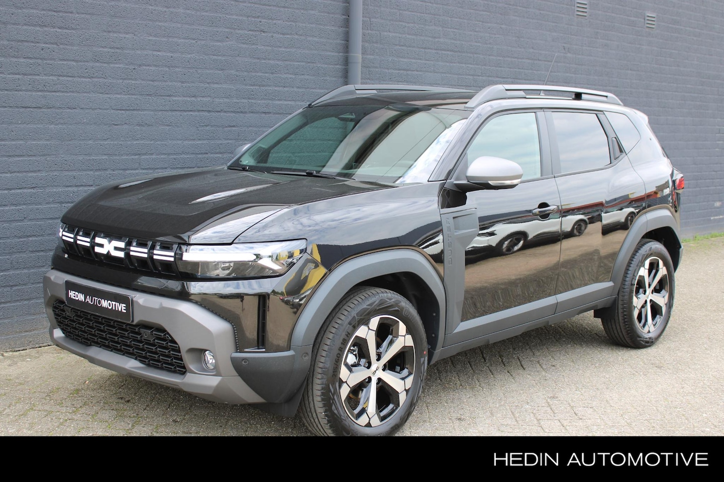 Dacia Duster - 1.6 Hybrid 140 Journey Pack Verwarming + Pack Parking - AutoWereld.nl