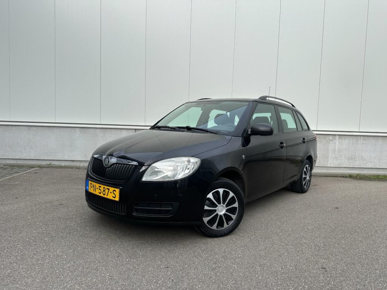 Skoda Fabia Combi - 1.2-12V Go - Airco / Elektr. ramen / Trekhaak / Bluetooth / NAP - AutoWereld.nl