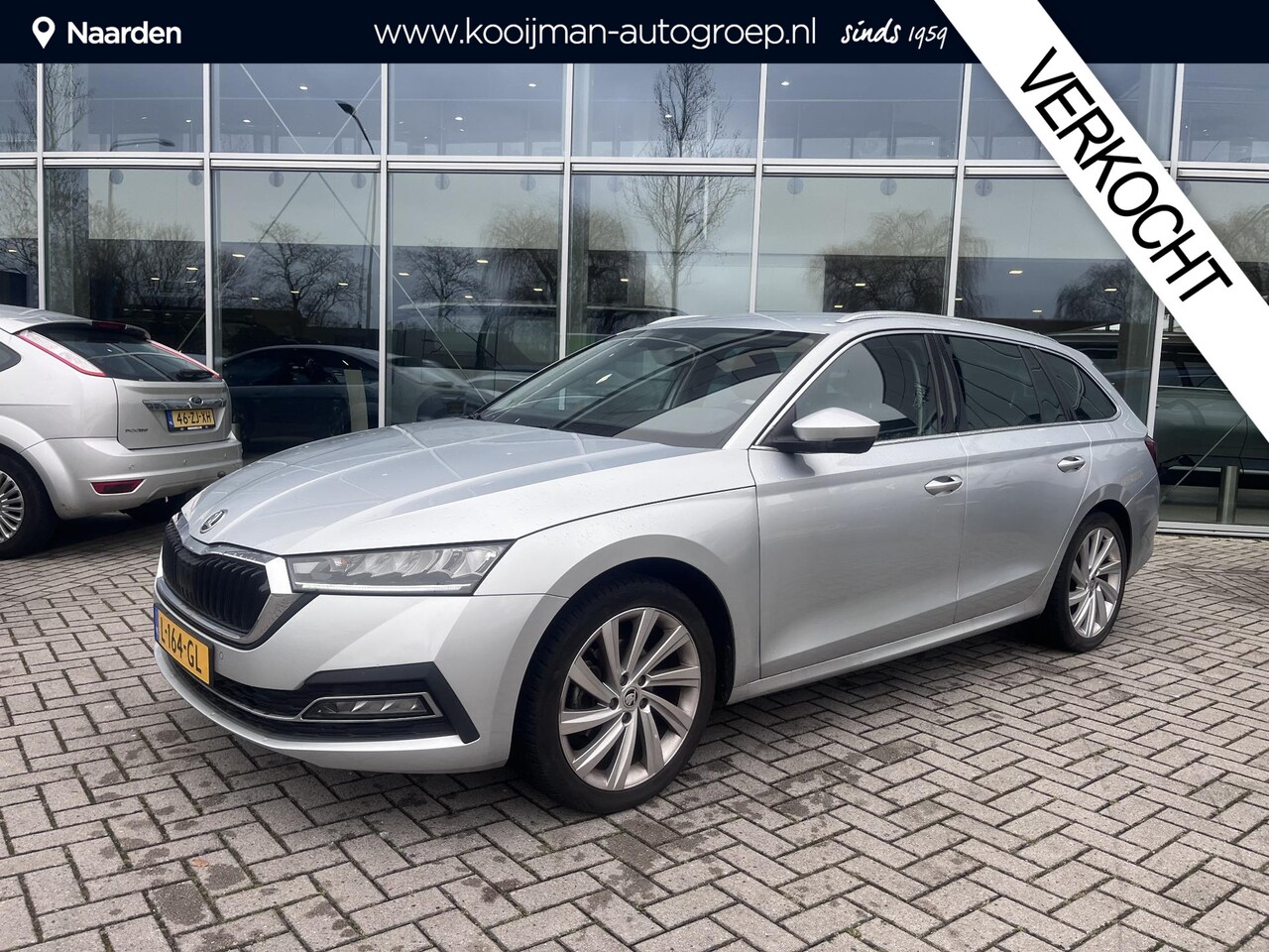 Skoda Octavia Combi - 1.0 e-TSI Business Edition Trekhaak - AutoWereld.nl