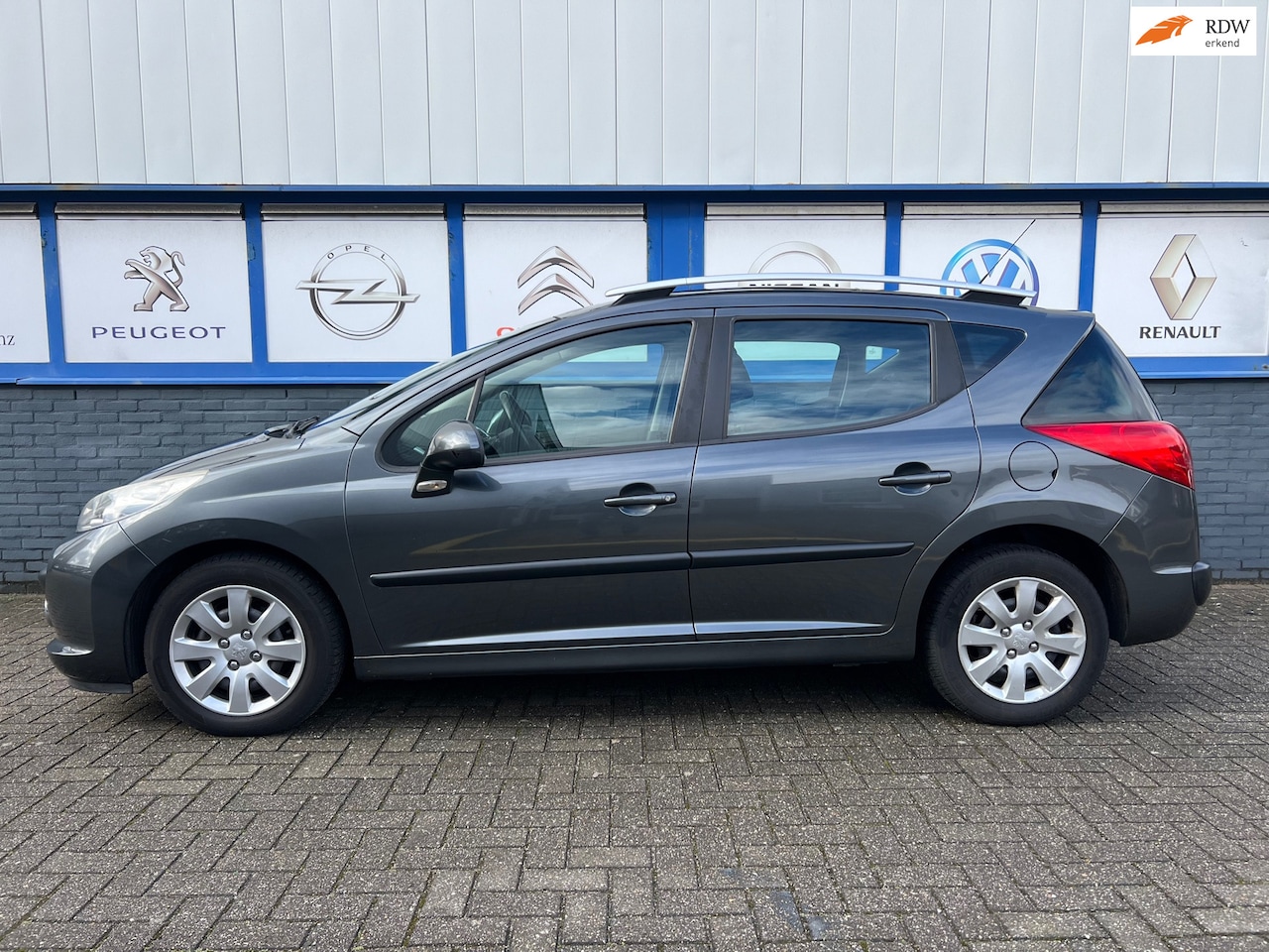Peugeot 207 SW - 1.6 VTi X-line automaat 10-2010 NWE.APK 2995EU - AutoWereld.nl