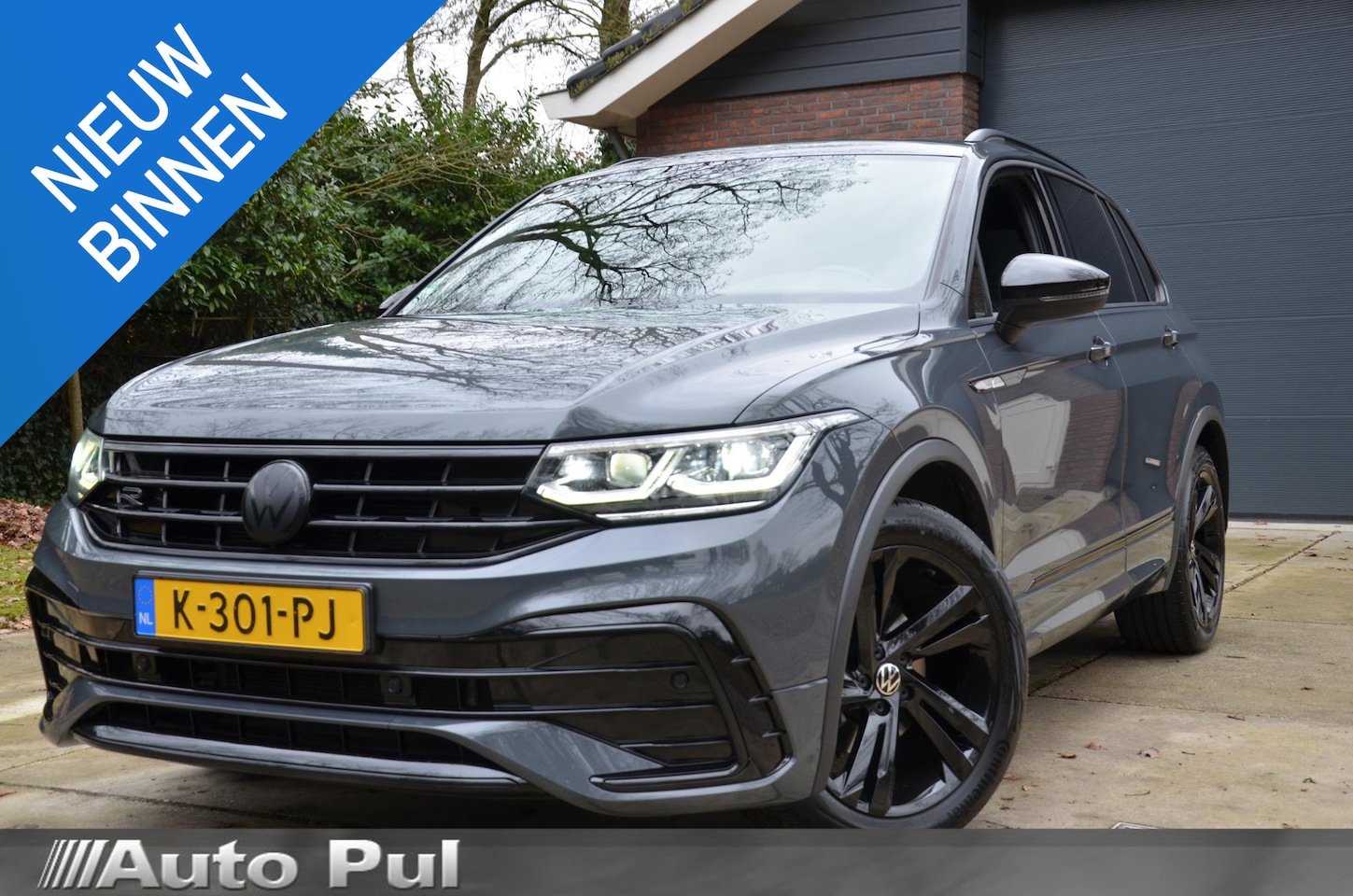 Volkswagen Tiguan - 1.5 TSI R-Line Business+ Navi/Pdc/Ecc/Achteruitrijcamera/Panoramadak/Virtueel dashboard/Pr - AutoWereld.nl