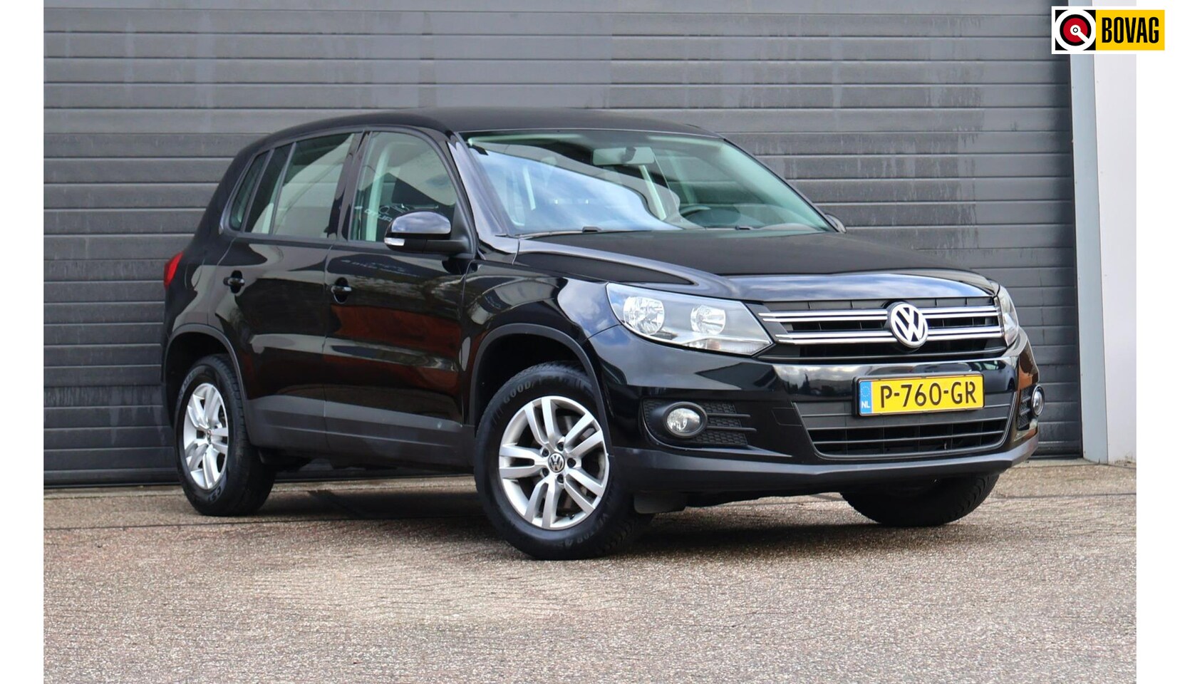 Volkswagen Tiguan - 1.4 TSI Sport&Style Clima/PDC/Navi/Netjes/Trekhaak - AutoWereld.nl