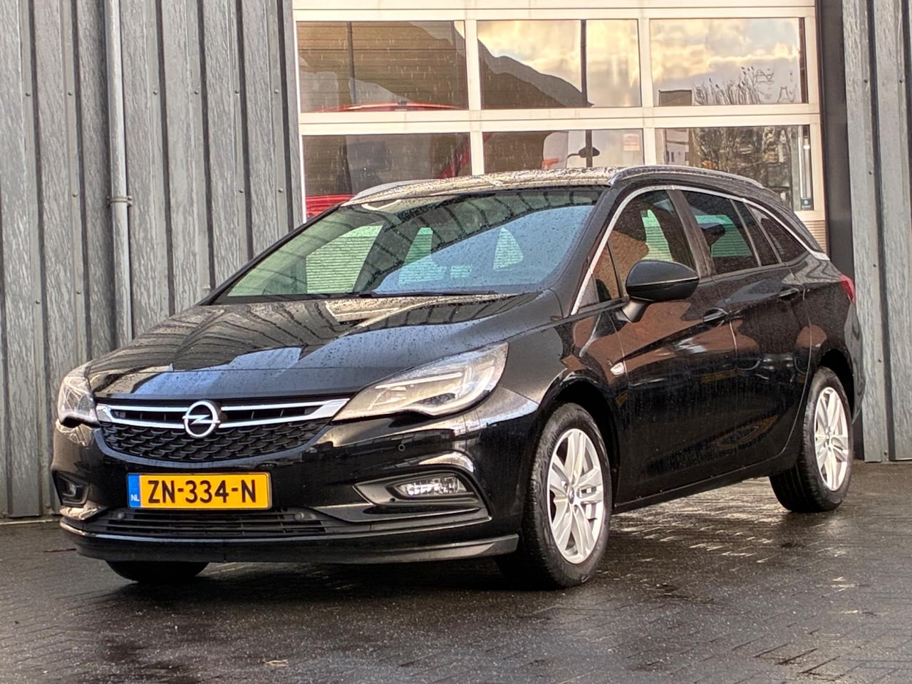 Opel Astra Sports Tourer - 1.0 Turbo Online Edition Navigatie Cruise controle Trekhaak - AutoWereld.nl