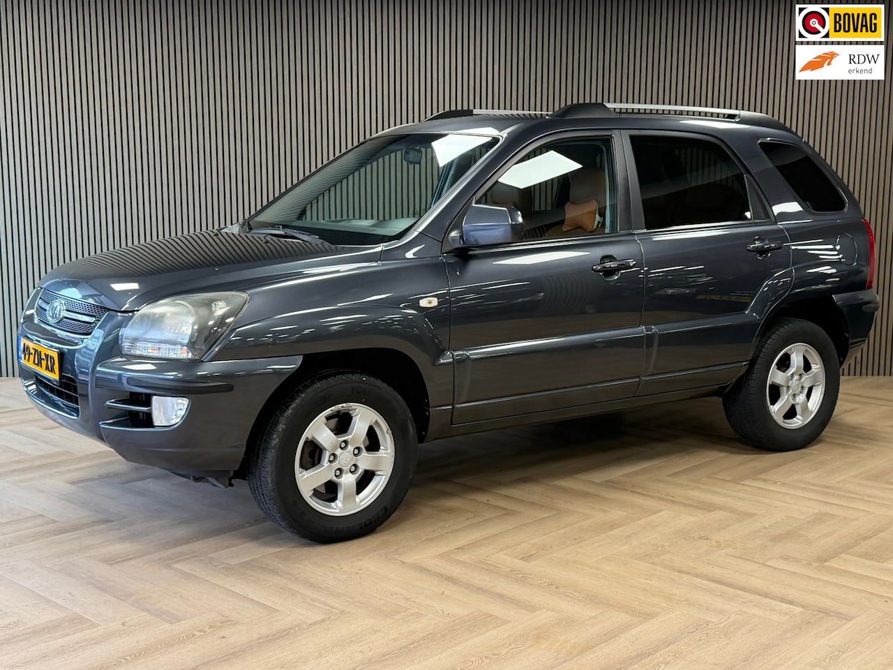 Kia Sportage - 2.0 CVVT X-ception TREKHAAK NAVIGATIE BLUETOOTH STOELVERWARMING LEDER PDC CRUISE AIRCO - AutoWereld.nl