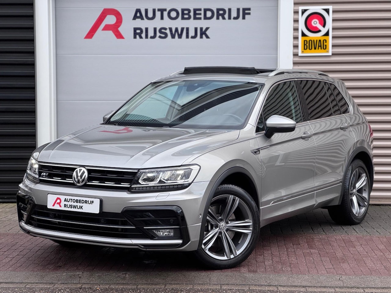 Volkswagen Tiguan - 2.0 TSI 4Motion Highline Pano/Blindspot/Virtual - AutoWereld.nl