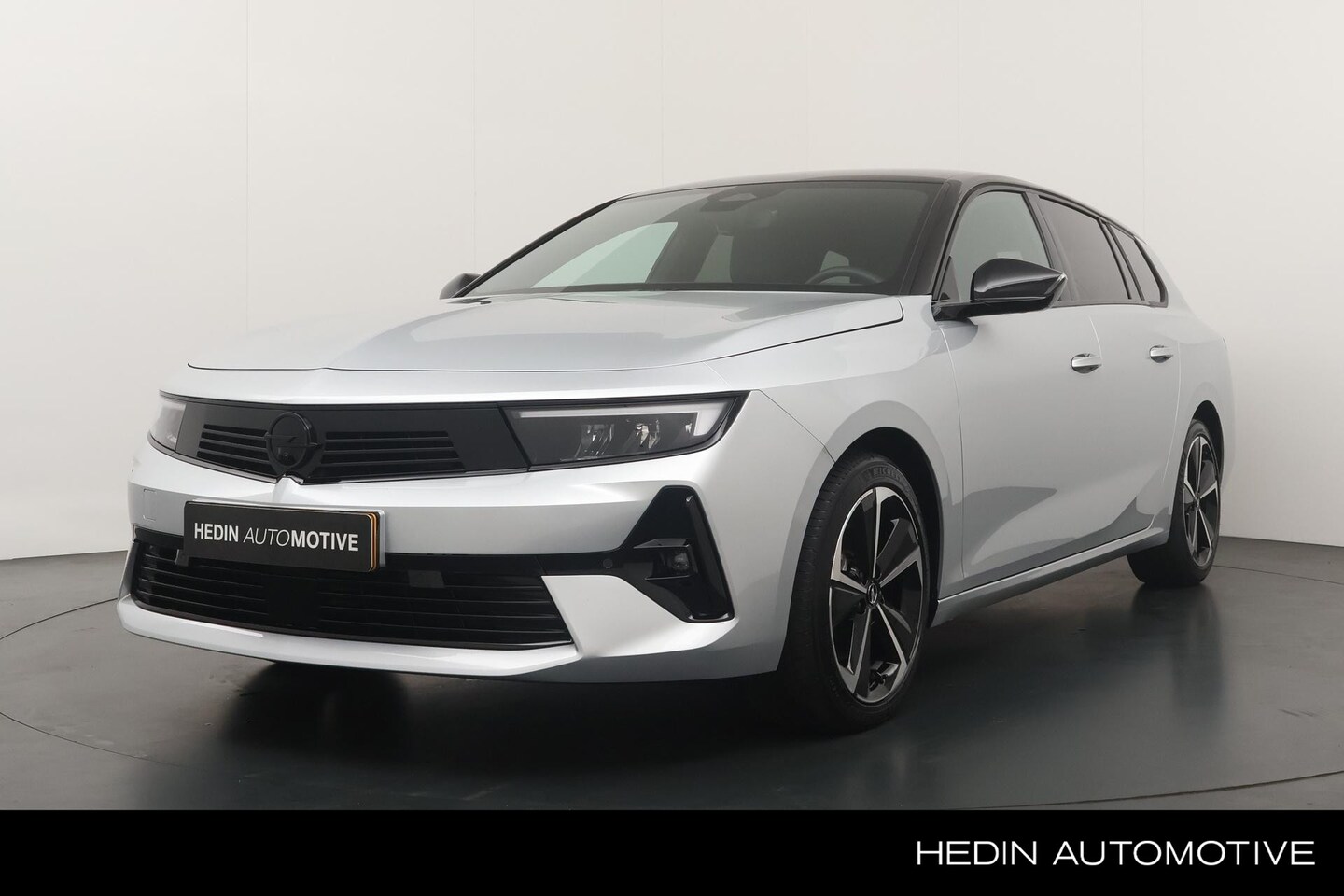 Opel Astra Sports Tourer - 1.2 145pk Hybrid GS | Navigatie | Adaptive Cruise Control | Stuur/Stoelverwarming | Camera - AutoWereld.nl