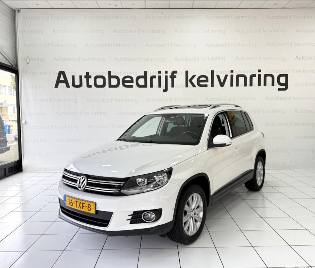Volkswagen Tiguan - 1.4 TSI Sport&Style Bovag Garantie Panoramadak - AutoWereld.nl