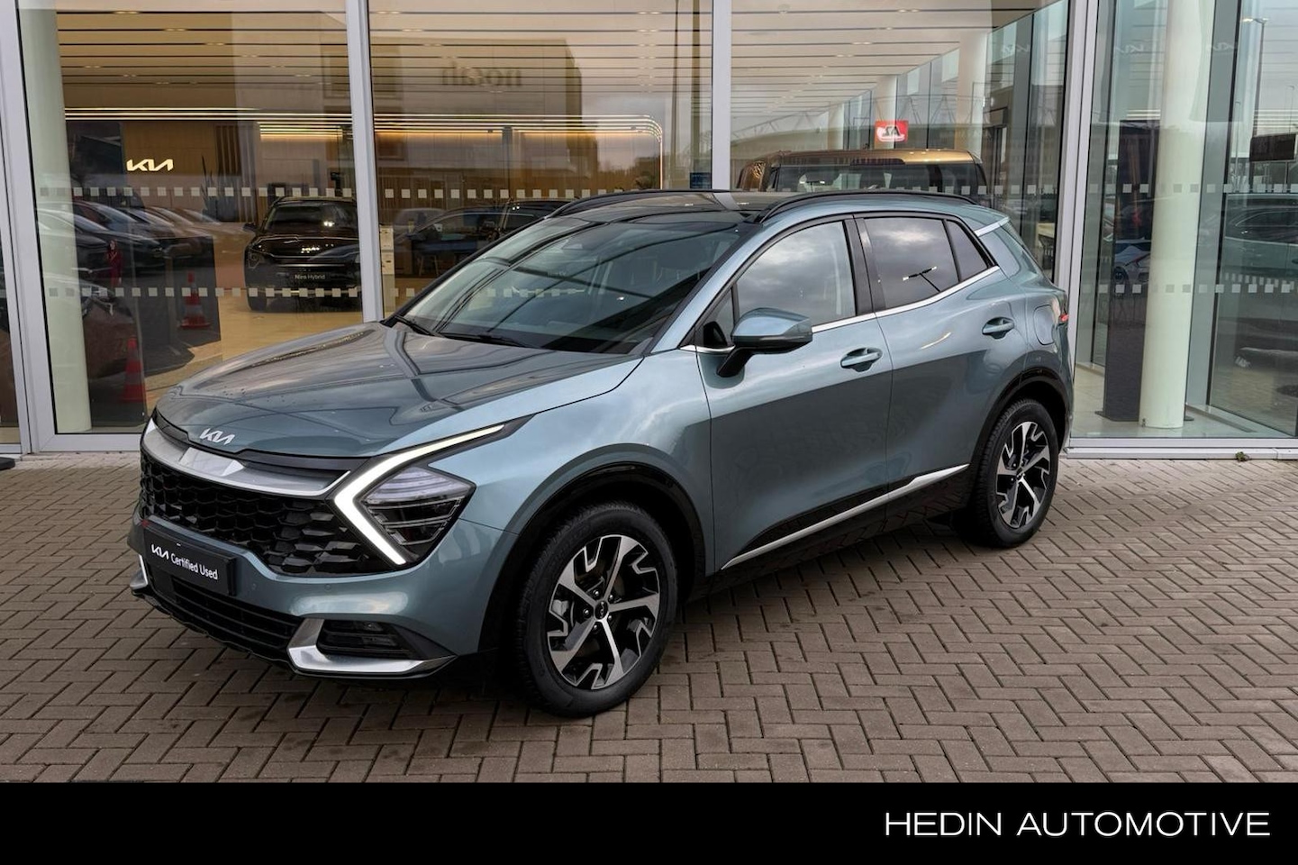 Kia Sportage - 1.6 T-GDi Hybrid DynamicPlusLine | El. stoelen | Stuur- & stoelvw. v/a | Panoramadak | El. - AutoWereld.nl