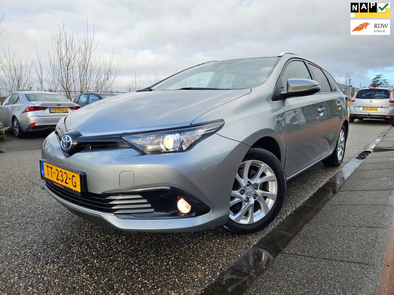 Toyota Auris Touring Sports - 1.8 Hybrid Dynamic GARANTIE Vol Opties - AutoWereld.nl