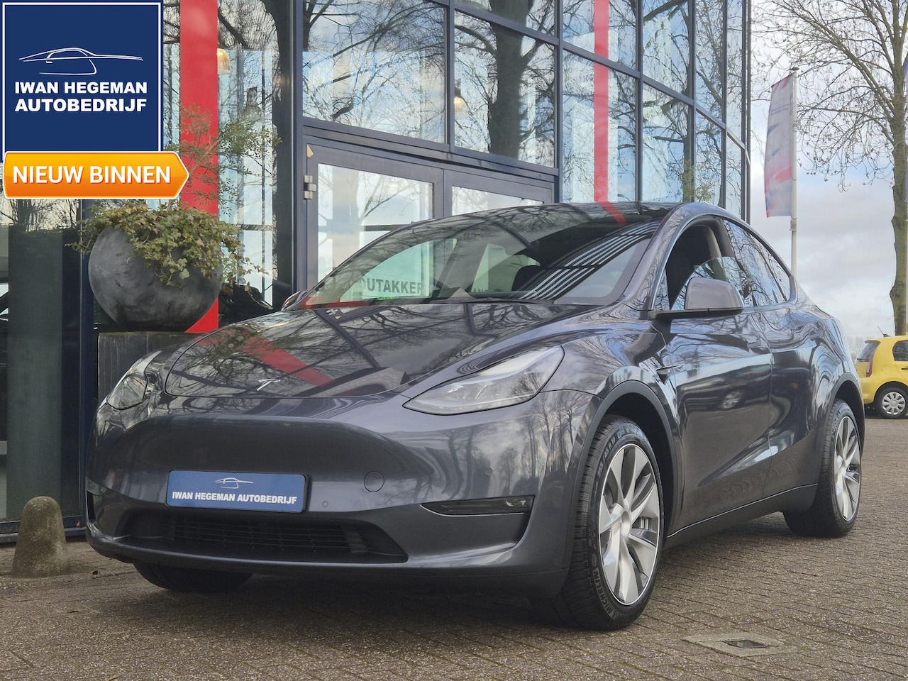 Tesla Model Y - AWD 75 kWh Long Range Dual Motor | Panodak | Navigatie | Climate Control | Parkeersensoren - AutoWereld.nl