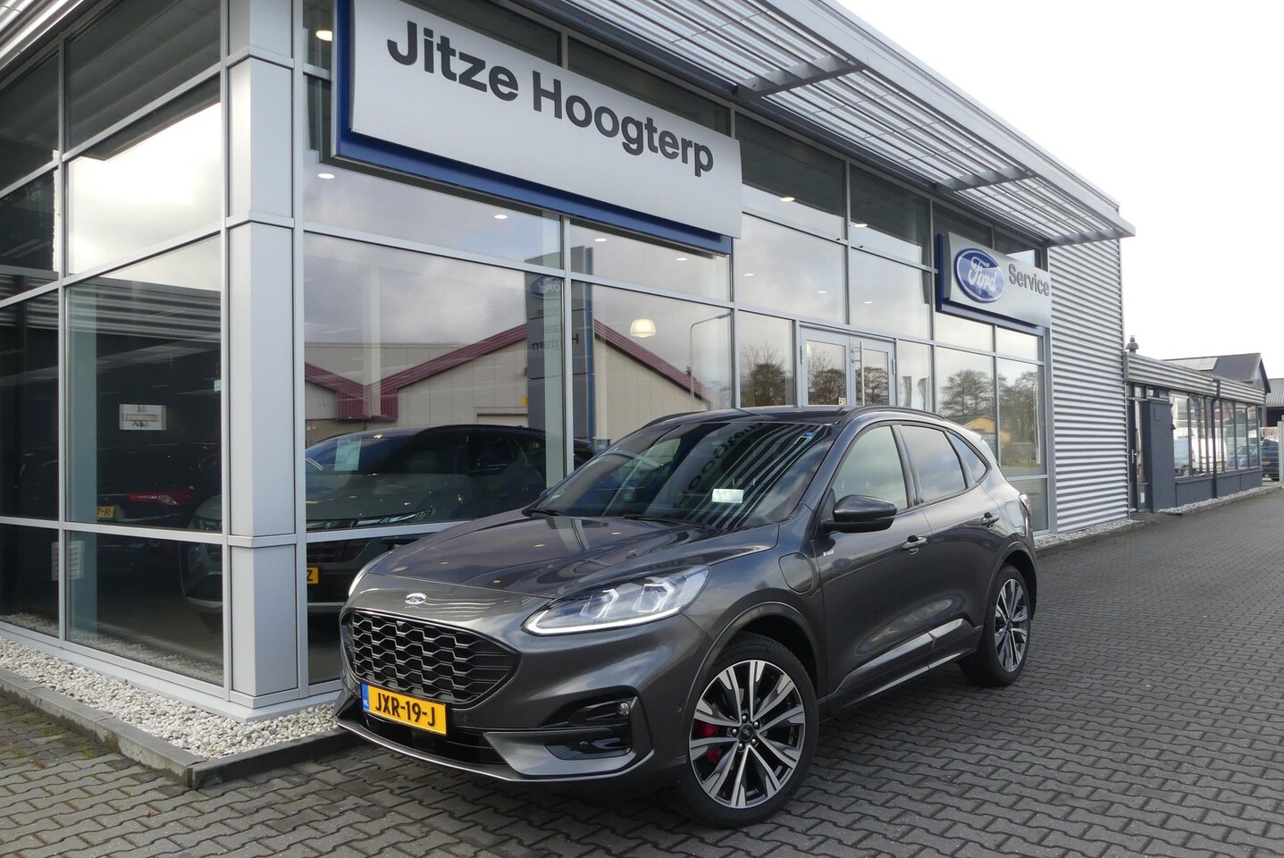 Ford Kuga - 2.5 PHEV ST-Line X TREKHAAK AFNEEMBAAR (1.500KG), HUD, WINTER PACK, ELEKT. STOEL, ADAPT. C - AutoWereld.nl