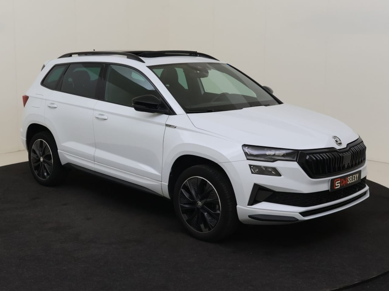 Skoda Karoq - 1.5 TSI Sportline Business Automaat Panoramaschuifdak - AutoWereld.nl