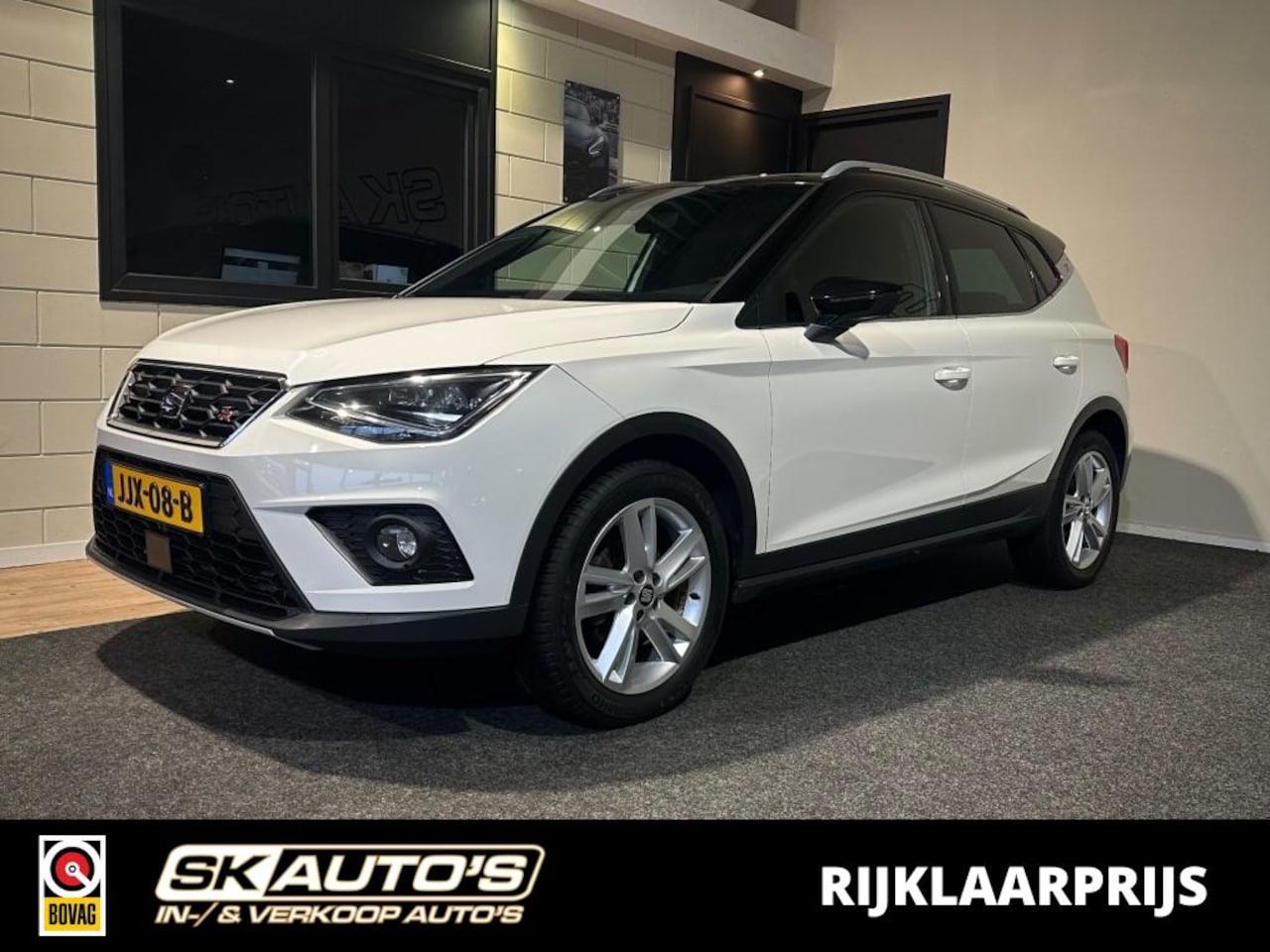 SEAT Arona - 1.0 TSI XC. B. INT. l SFEEFVERL l NAVI l LMV l ACC l STOELVERW l LED l - AutoWereld.nl