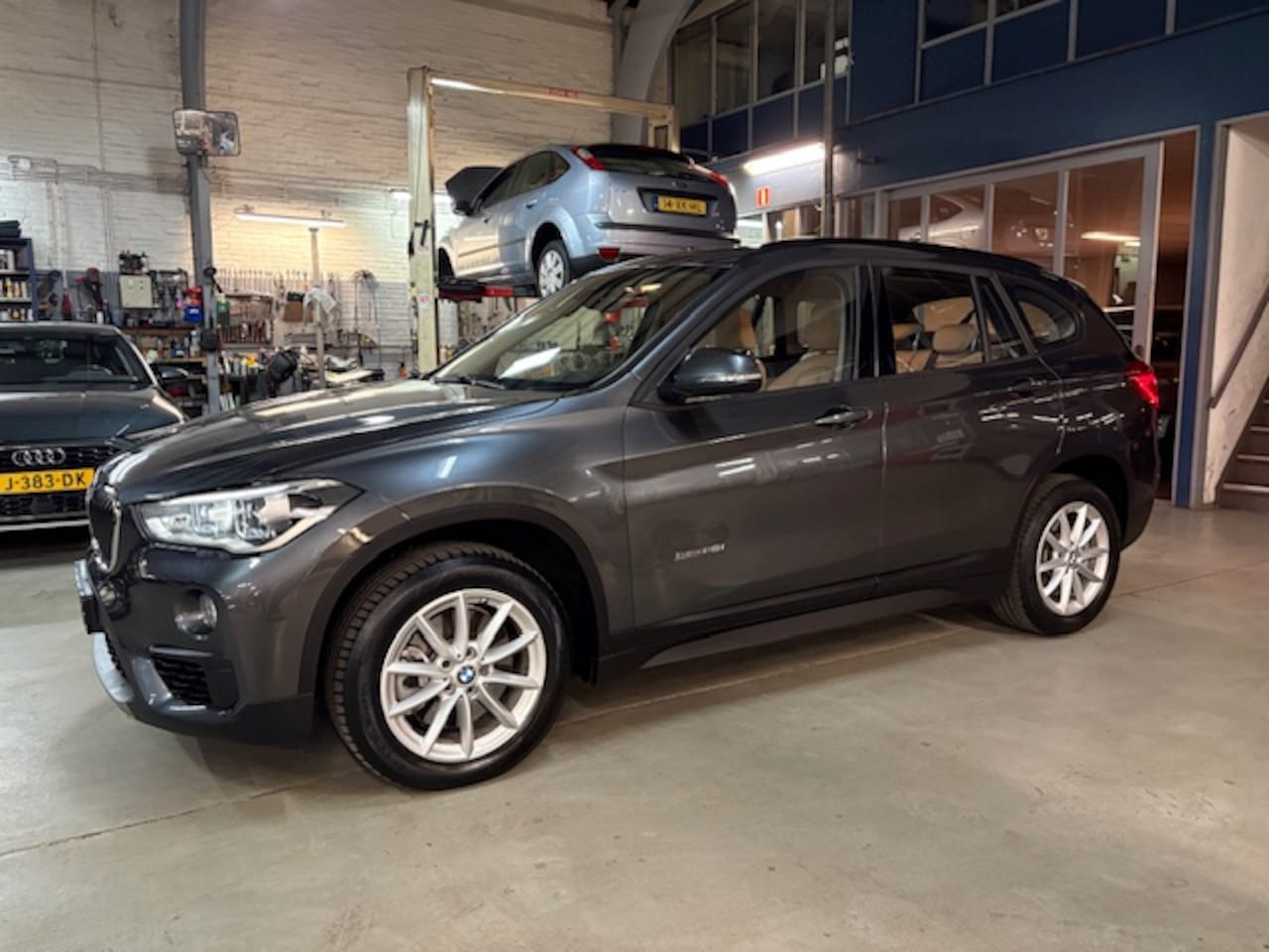 BMW X1 - (f48) sDrive20i Automaat Corporate Lease | Navigatie | Lederen bekleding | pdc | Climate c - AutoWereld.nl