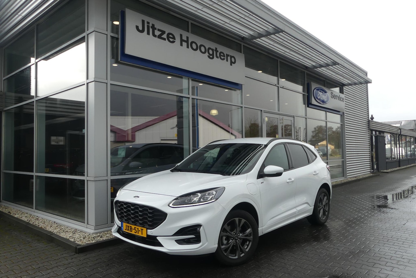 Ford Kuga - 2.5 PHEV ST-Line X ELEKT. TREKHAAK (1.500KG), PANO, HUD, WINTER PACK, ADAPT. CRUISE, CLIMA - AutoWereld.nl