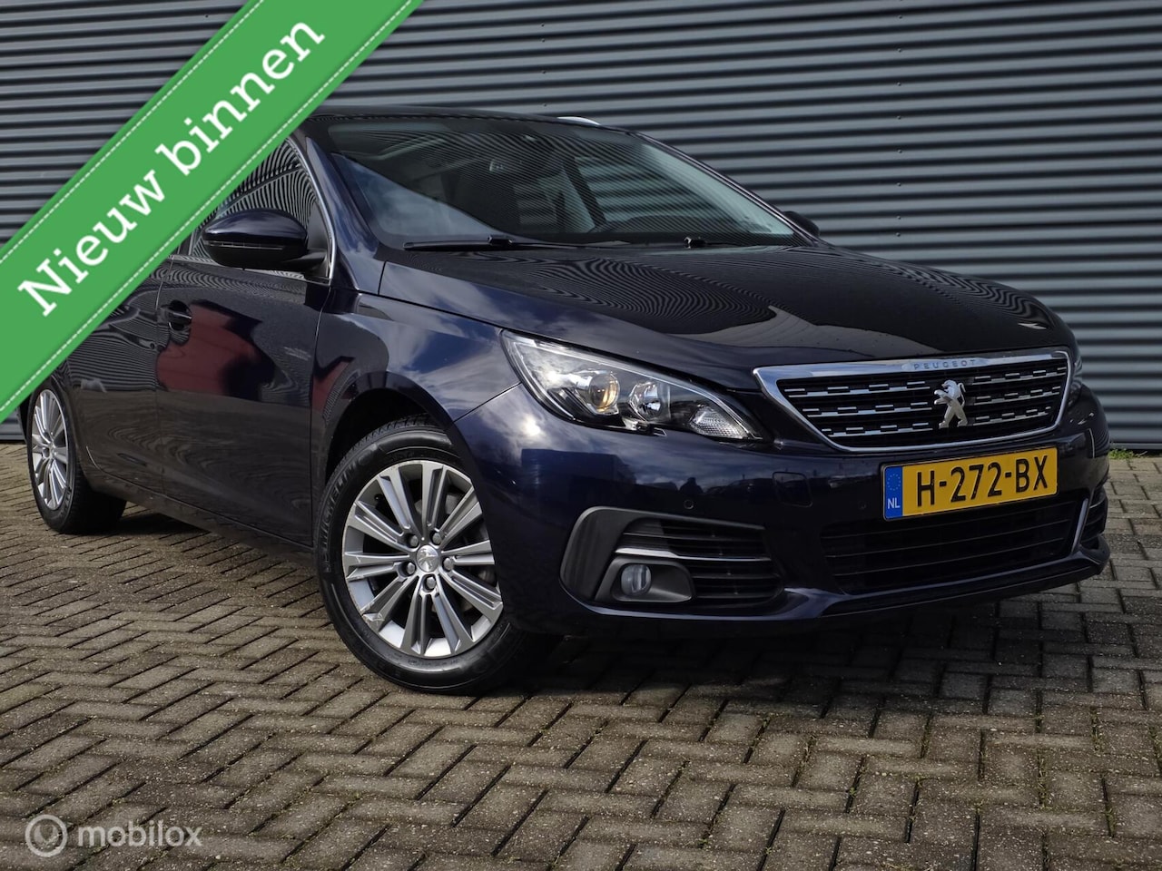 Peugeot 308 SW - 1.2 PureTech Blue Lease Premium AUTOMAAT/TREKHAAK - AutoWereld.nl